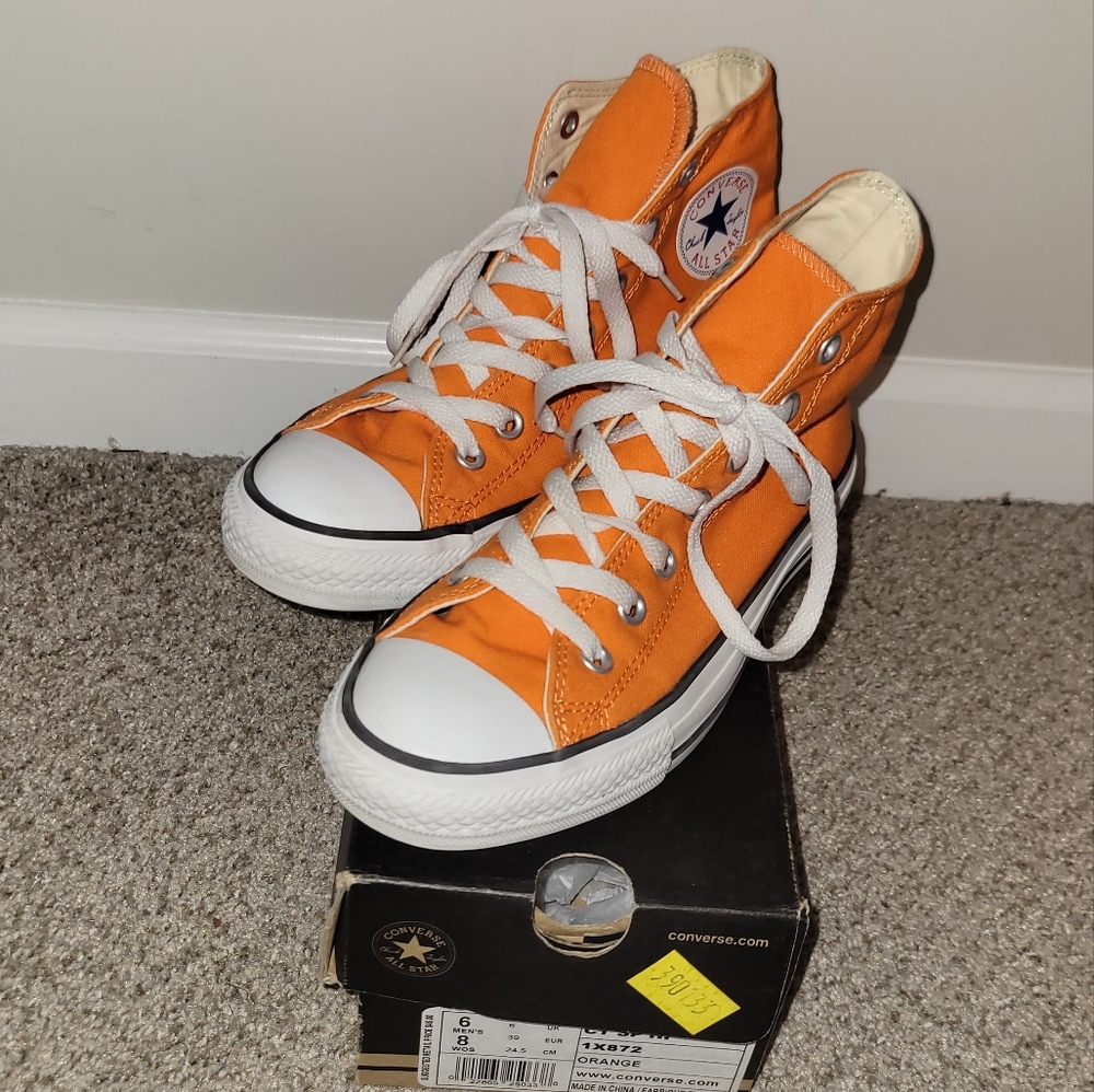 Converse chucks Taylor high top.  Orange men's 6 women's 8